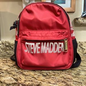Steve Madden red/white signature logo backpack.